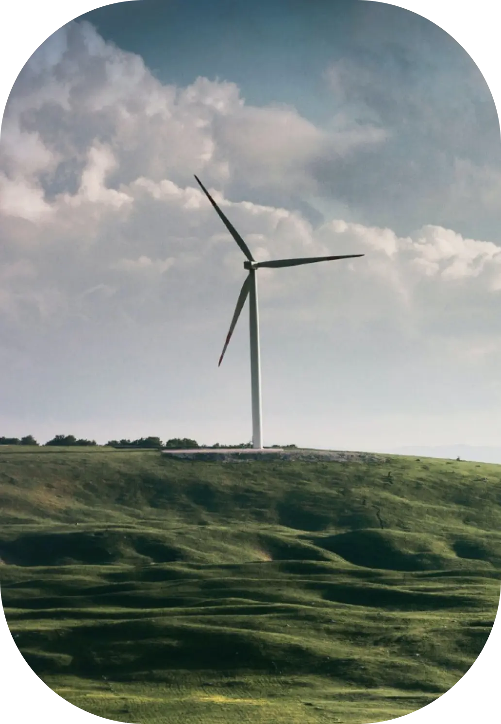 Wind turbines on a green hillside