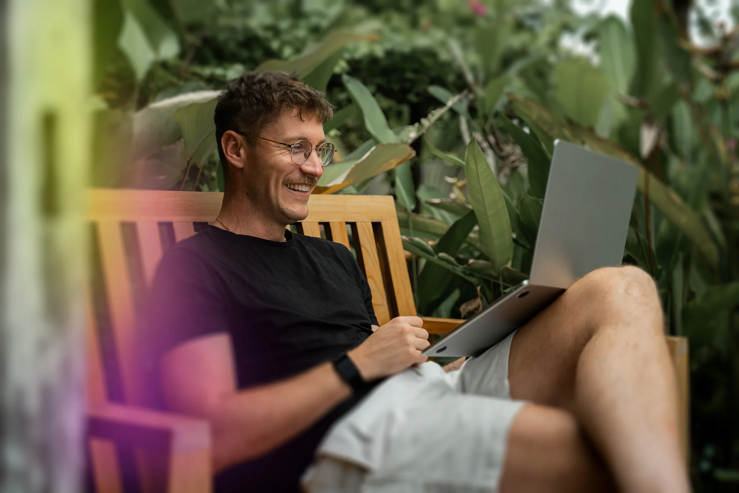Financial trader monitoring markets on screens